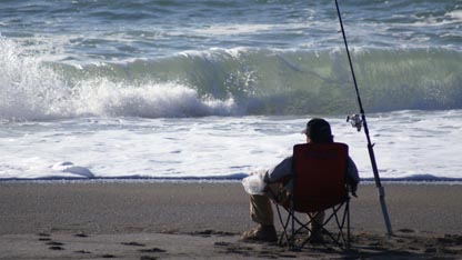 Pgoto of man fishing on Nokomis Beach