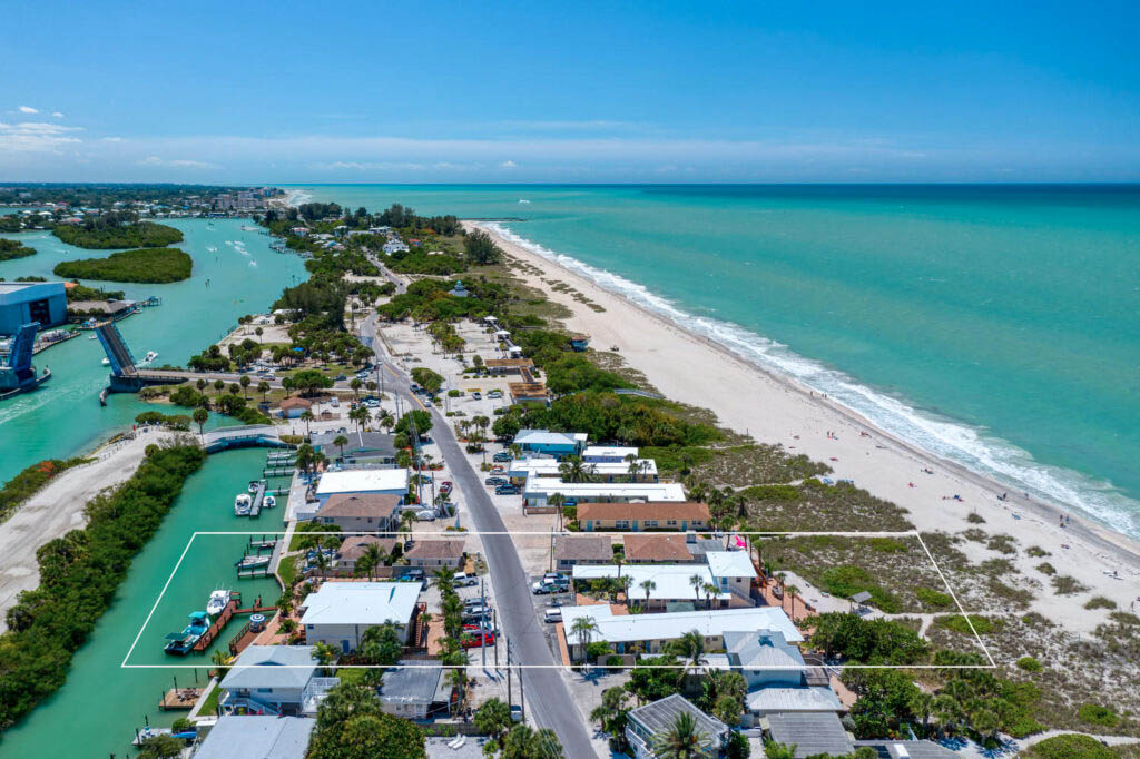 Aerial footage of the antire property from beach to bay